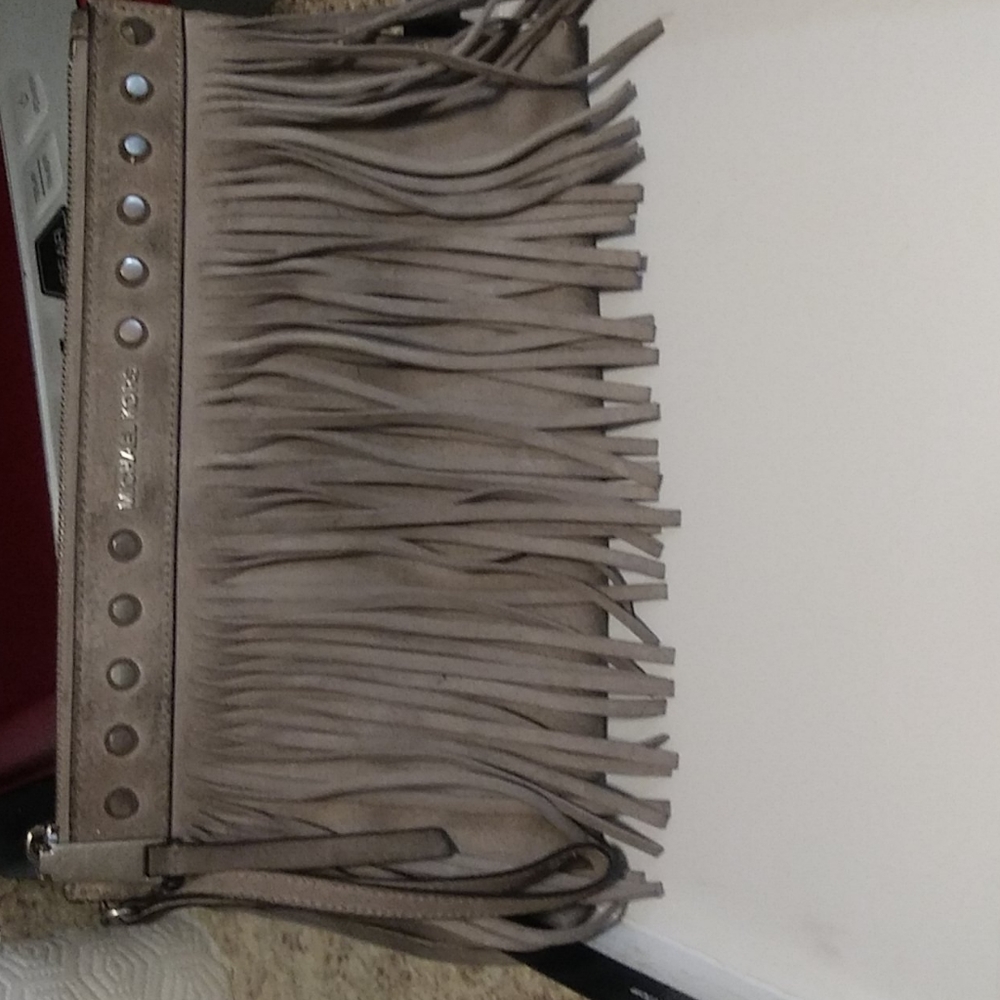 Michael Kors Sued clutch